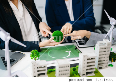 Business team people planning hand using laptop for working technology and business Net zero and carbon neutral concept.NET ZERO icons and symbols save the eco world and reduce pollution. 124213009