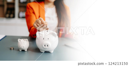 woman hand coins with piggy bank. business finance saving and investment concept. woman hand coins with piggy bank. business finance saving and investment concept. 124213150