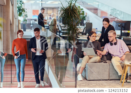 In a modern startup office, a diverse group of young professionals collaboratively tackles various business problems and challenges, surrounded by their engaged colleagues, fostering innovation and 124213152