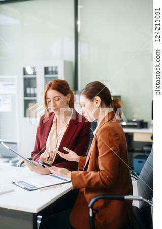 Modern lawyer office a professional discussion, legal documents, and teamwork. Perfect for business, legal advice Modern lawyer office a professional discussion, legal documents, and teamwork. Perfect for business, legal advice 124213691