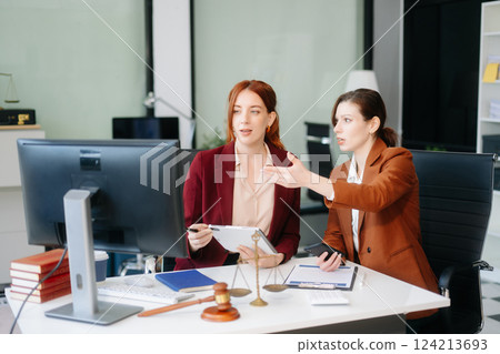 Modern lawyer office a professional discussion, legal documents, and teamwork. Perfect for business, legal advice Modern lawyer office a professional discussion, legal documents, and teamwork. Perfect for business, legal advice 124213693