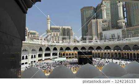 Muslim pilgrims perform Tawaf around the Kaaba after dawn prayer at Masjid al-Haram in Makkah, Saudi Arabia. Muslims worldwide face the Kaaba in prayer, symbolizing unity and devotion in Islam 124216153