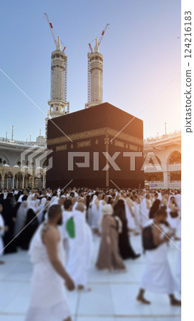 Muslim pilgrims perform Tawaf around the Kaaba after dawn prayer at Masjid al-Haram in Makkah, Saudi Arabia. Muslims worldwide face the Kaaba in prayer, symbolizing unity and devotion in Islam 124216183