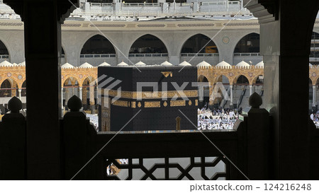 Muslim pilgrims perform Tawaf around the Kaaba after dawn prayer at Masjid al-Haram in Makkah, Saudi Arabia. Muslims worldwide face the Kaaba in prayer, symbolizing unity and devotion in Islam 124216248