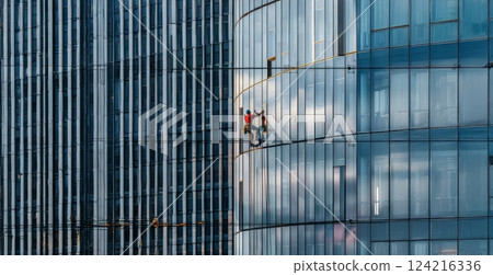 Worker cleaning windows on a high rise building.Generated image Worker cleaning windows on a high rise building.Generated image 124216336