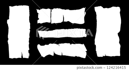 Torn papers lay scattered, showcasing their uneven edges and textures. Each piece tells a story of creativity, chaos, or forgotten moments waiting to be revived against a contrasting black backdrop. 124216415