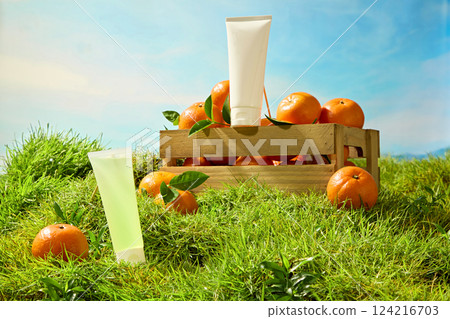 Mockup tube set in the middle of green turf and oranges. White unlabeled cream tube stands on a wooden ledge, decorated with fresh green leaves. Nature concept used for product advertising. Mockup tube set in the middle of green turf and oranges. White unlabeled cream tube stands on a wooden ledge, decorated with fresh green leaves. Nature concept used for product advertising. 124216703
