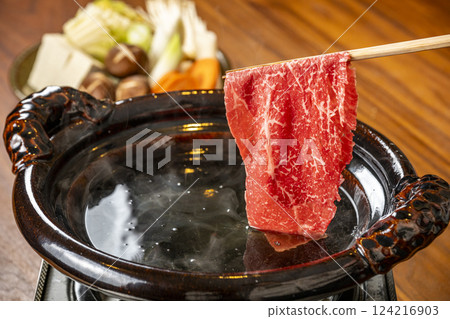 Shabu-shabu: Dip beef in broth 124216903