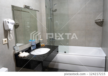 Clean white bathroom design 124217215
