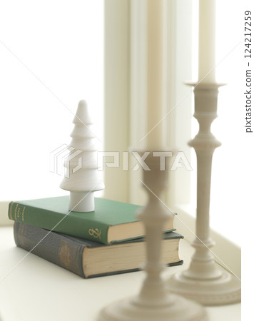 Christmas image decorated on a bright window 124217259