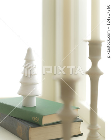 Christmas image decorated on a bright window 124217260