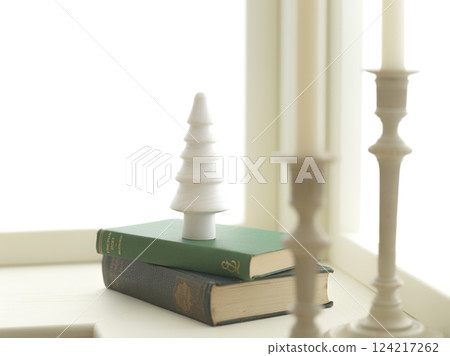 Christmas image decorated on a bright window 124217262