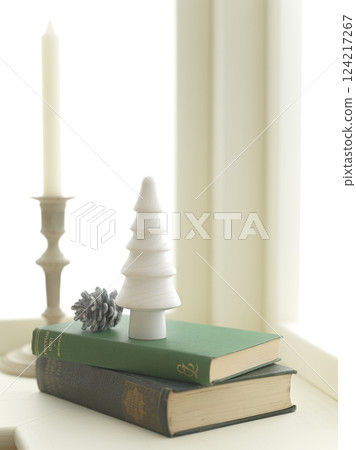 Christmas image decorated on a bright window 124217267