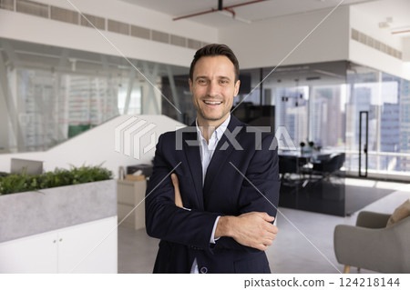 Cheerful confident businessman posing for business professional portrait 124218144