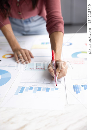 Female business project leader developing successful marketing strategy Female business project leader developing successful marketing strategy 124218749