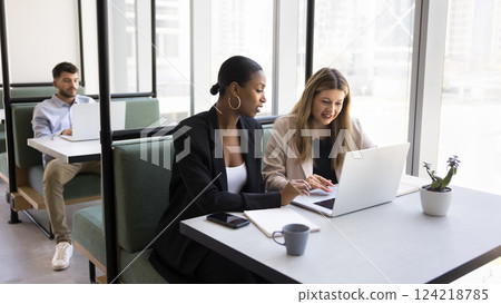 Workday of diverse people in modern coworking office 124218785