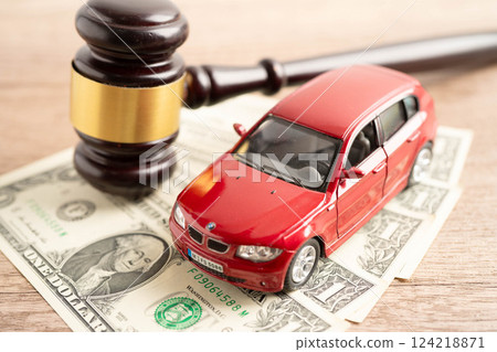 Bangkok, Thailand November 18, 2023 Car on banknote money, buying or insurance concept. 124218871