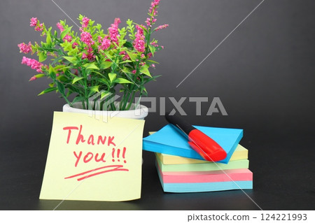 inscription thank you, on a yellow sticker 124221993