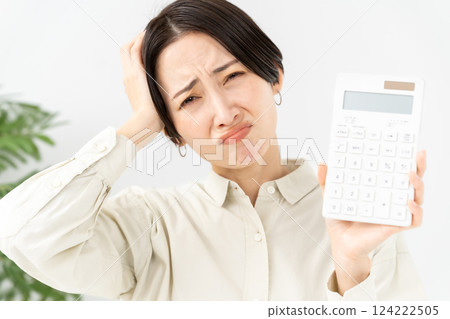 A woman with a calculator Trouble A woman with a calculator Trouble 124222505