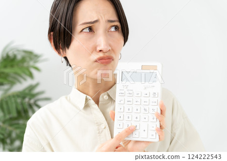 A woman with a calculator Trouble 124222543