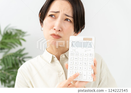 A woman with a calculator Trouble 124222545