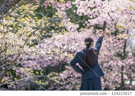 Female student with a diploma Female student with a diploma 124223017