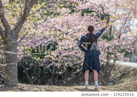Female student with a diploma Female student with a diploma 124223018