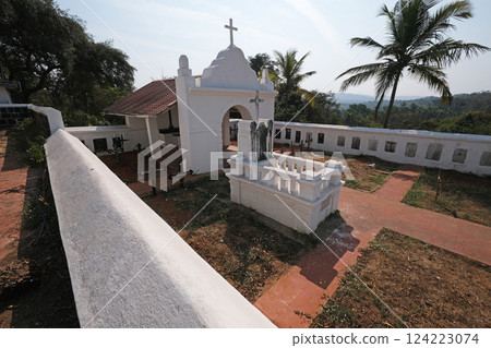 Cemetery next to St. Blaise Catholic Church in Gandaulim, Goa, India Cemetery next to St. Blaise Catholic Church in Gandaulim, Goa, India 124223074