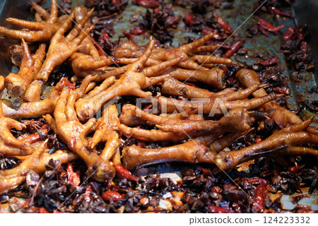 Spicy fried chicken legs, street food restaurant in Chinese water village Xitang in Zhejiang Province, China 124223332