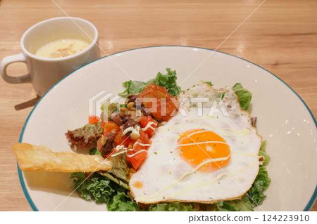 Taco rice with fried egg and soup Taco rice with fried egg and soup 124223910