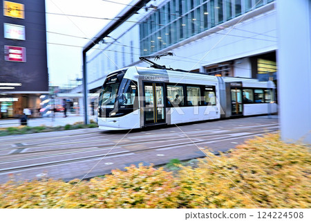 Portram tram running in front of Toyama Station Portram tram running in front of Toyama Station 124224508