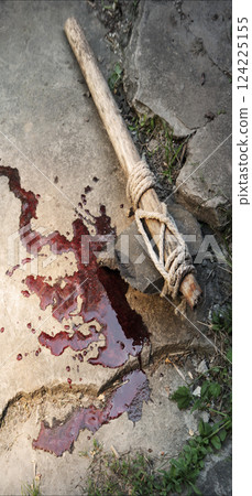 Stone axe with red blood Stone axe with red blood 124225155