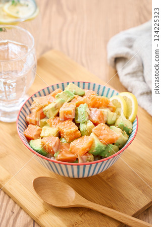 Salmon and avocado poke bowl Salmon and avocado poke bowl 124225323
