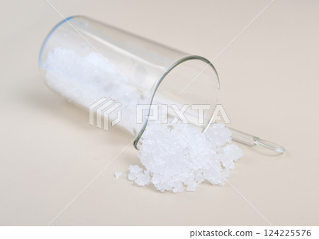 Zinc nitrate on the beige background 124225576