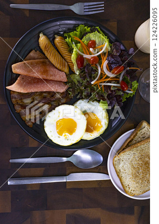 Above View Of A Breakfast Set On A Wooden Table 124226095