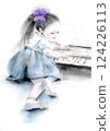 A cute girl lying down and playing the piano 124226113