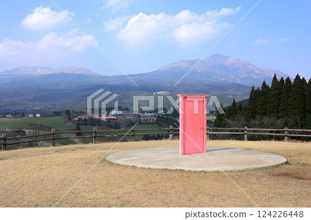 The pink door and Mount Takachiho seen from Hitsujigaoka Observatory at Takachiho Ranch 124226448