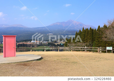 The pink door and Mount Takachiho seen from Hitsujigaoka Observatory at Takachiho Ranch 124226460