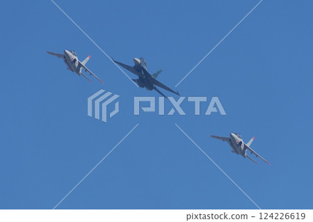 The Air Self-Defense Force's Flight Development and Test Wing's F-2 and T-4 flying in formation at an air show The Air Self-Defense Force's Flight Development and Test Wing's F-2 and T-4 flying in formation at an air show 124226619