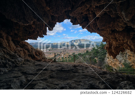 View of the exit from the cave in the mountains View of the exit from the cave in the mountains 124226682