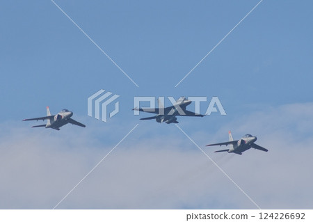 The Air Self-Defense Force's Flight Development and Test Wing's F-2 and T-4 flying in formation at an air show The Air Self-Defense Force's Flight Development and Test Wing's F-2 and T-4 flying in formation at an air show 124226692