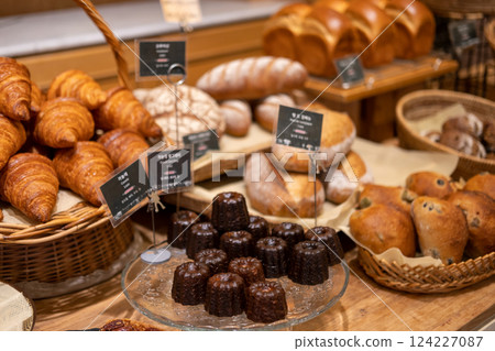 Various types of bakery in the restaurant, such as canale, croissant. 124227087
