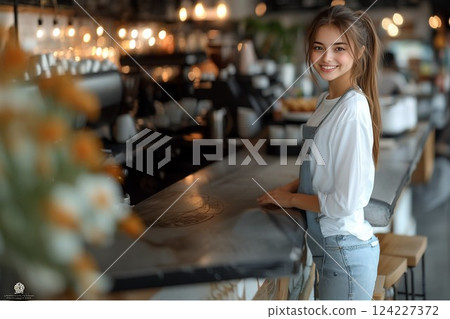 A woman working in a cafe 124227372