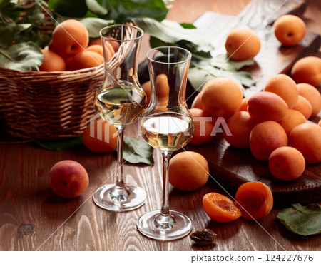 Apricot liquor with fresh fruits. Apricot liquor with fresh fruits. 124227676
