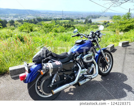 A hilltop with a touring bike 124228371