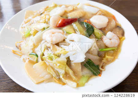 Delicious fried noodles with mixed vegetables and sauce Delicious fried noodles with mixed vegetables and sauce 124228619