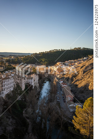 aerial view of historical district of Cuenca town, river and mountains landscape 124228975