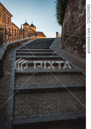 ancient stairs with pavement of old cozy European town, Cuenca, Spain 124228983