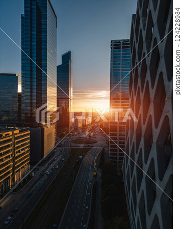 downtown of big capital city with skyscraper towers and modern tall office buildings, skyline and contemporary architecture of financial district, Warsaw, Poland, aerial top view 124228984