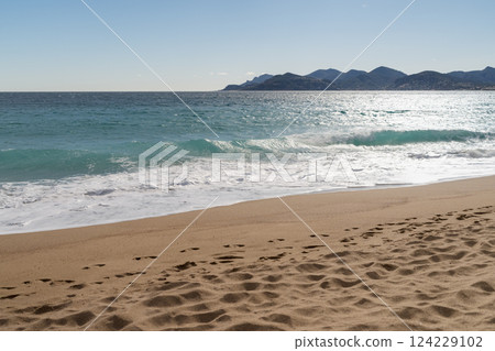 Sand beach of South France during spring with sea waves 124229102